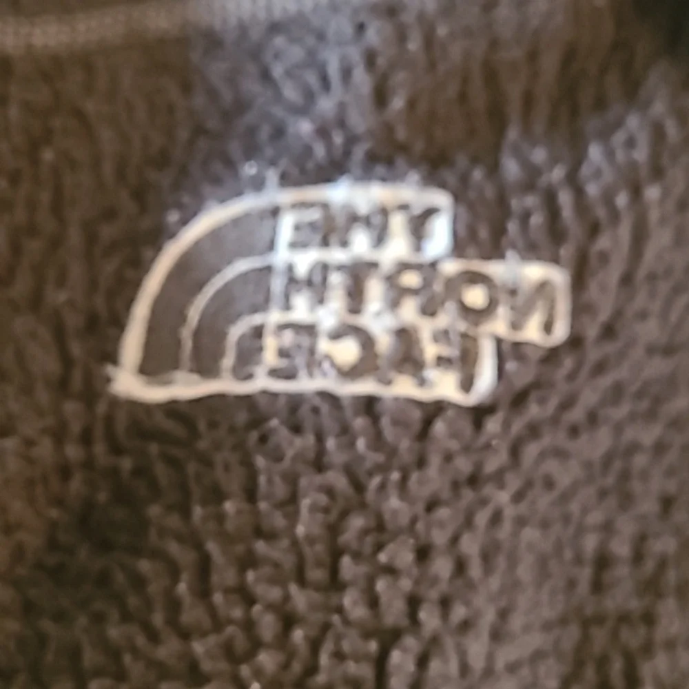 Northface full zip fleece jacket. Dark gray mens sz. Med.(#486)
